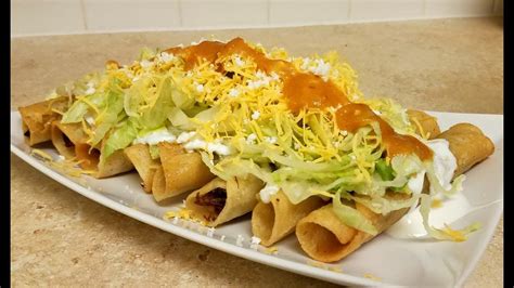 How To Make Rolled Tacos Taquitos Recipe Rolled Tacos Recipe Taquitos Beef Roll