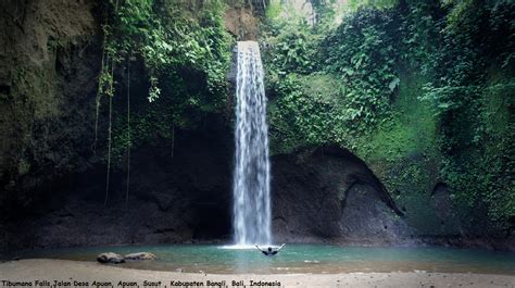 Tibumana Waterfall With Its Spiritual Faith Palm Living