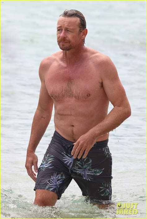 Simon Baker Looks Fit Going For A Dip In The Ocean Photo
