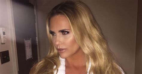 Katie Price Bares Some Serious Cleavage As She Strips Down To A Fluffy