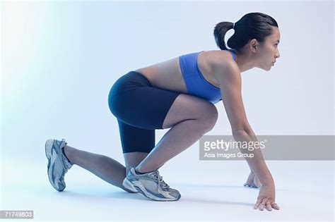 Asain Woman Kneel Photos And Premium High Res Pictures Getty Images