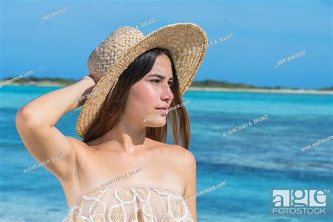 Beautiful Latin Woman Wearing Nude Bikini On Tropical Beach Stock