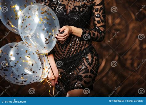 Attractive Woman Holding Baloons And Smiling Party And Holiday Season Concept Stock Image