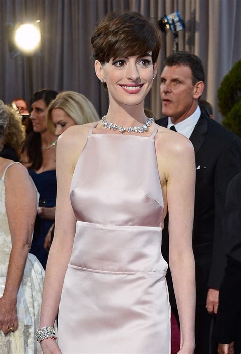 Why Anne Hathaway Was Wearing A Dress That Made It Look Like She Had A Wardrobe Malfunction