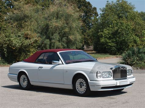 From the world's pinnacle motor car phantom to the bold attitude of black badge and beyond. 2002 Rolls-Royce Corniche V | Duemila Ruote 2016 | RM Auctions