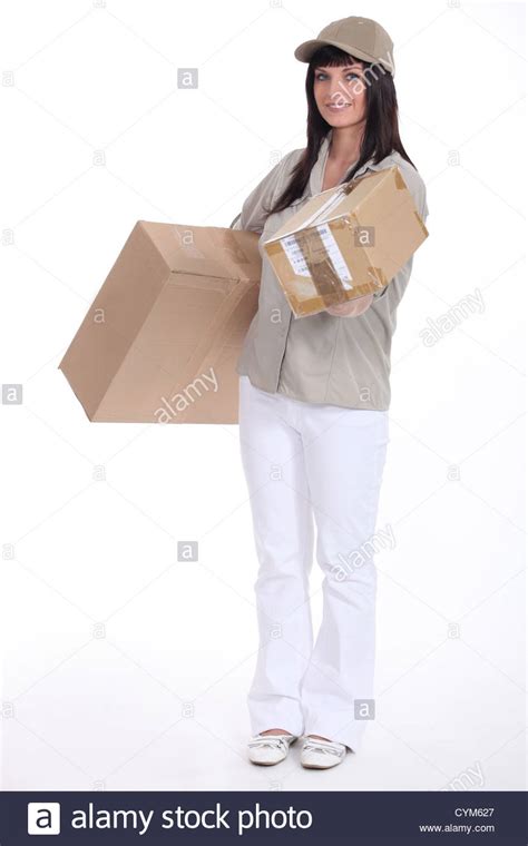 Mail Carrier Delivering A Package Stock Photo Alamy