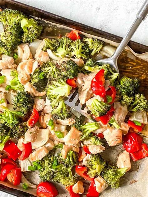 This sheet pan sesame chicken and veggies makes the perfect weeknight dinner that's healthy, delicious and easily made all on one pan in under 30 minutes! Sheet Pan Sesame Chicken and Veggies - Real Food with Sarah