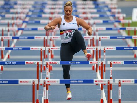 a belgian shot putter runs the hurdles after answering her team s call for help