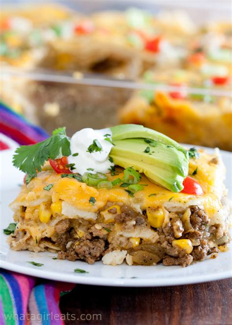 Return the onion and pepper mixture to the pan, add half of the enchilada sauce, and drained kidney beans, season well and cook for a further minute. Layered Chicken Enchilada Casserole With Green Sauce - Chicken Enchilada Casserole Chelsea S ...