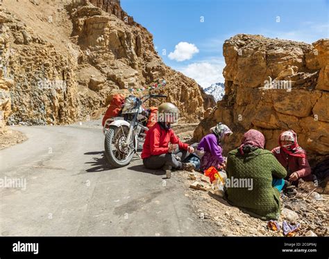 A Traveller Having Tea With Local People In Spiti Valley Himachal