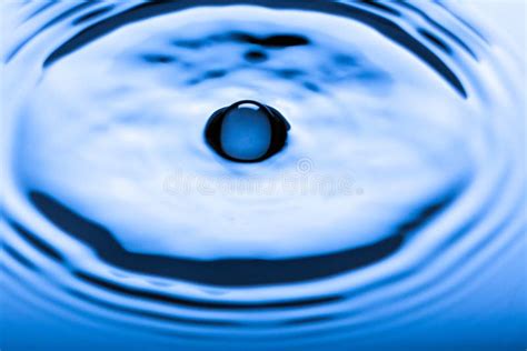 Blue Water Droplets On A Shiny Surface Stock Photo Image Of Isolated