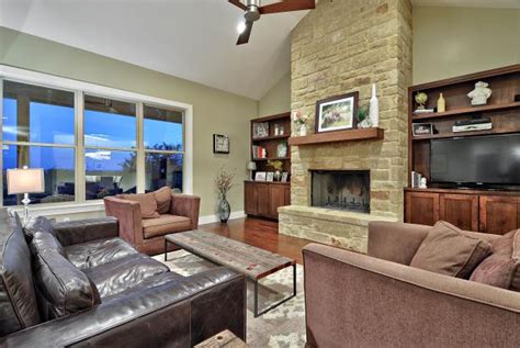 Neutral Transitional Living Room With Stone Fireplace Hgtv