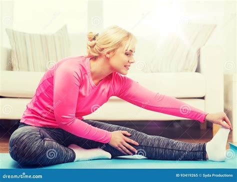 Happy Woman Stretching Leg On Mat At Home Stock Image Image Of Female Home 93419265