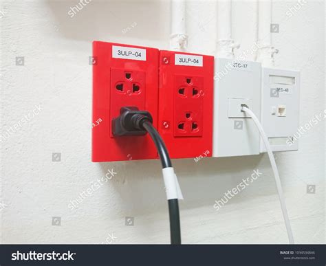 Red Electrical Outlet Power Plug Installed Stock Photo 1094534846