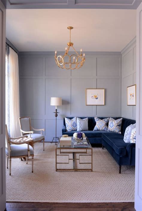 Details like tufted buttons and bronze claw feet give the velvet furniture piece character and let the fabric speak for itself. Dering Hall | Blue couch living room, Blue sofas living ...