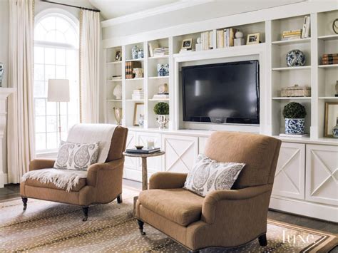 Contemporary White Seating Area With Custom Built In Bookcase