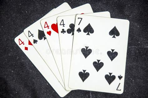 Five Playing Card S A Hand Of A Four Of A Kind Four S And A Seven Stock
