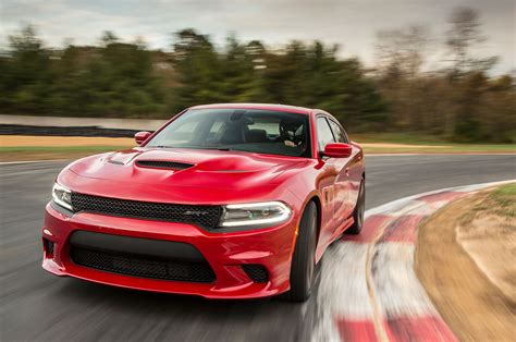 2015 Dodge Charger Srt Hellcat Front Three Quarter View In Motion 11