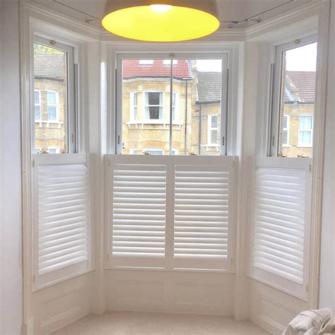 Only covering the lower portion of the window, café style shutters aren't ideal where total privacy or darkness is required. Café style shutters | London Interior Shutters