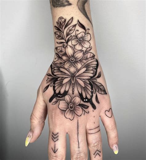 25 Beautiful Butterfly Hand Tattoos For Girls With Meanings In 2022
