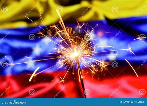 Close Up Of Sparkler Burning Over Venezuela Venezuelan Flag Holidays