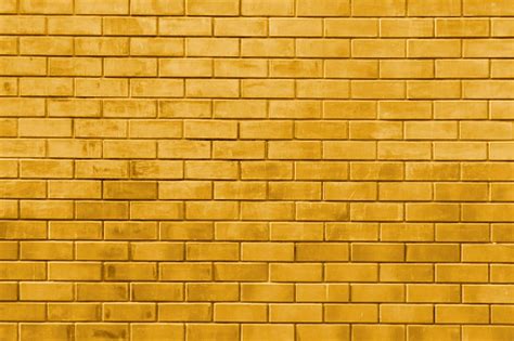 Yellow Gold Brick Wall Abstract Texture Background Stock Photo