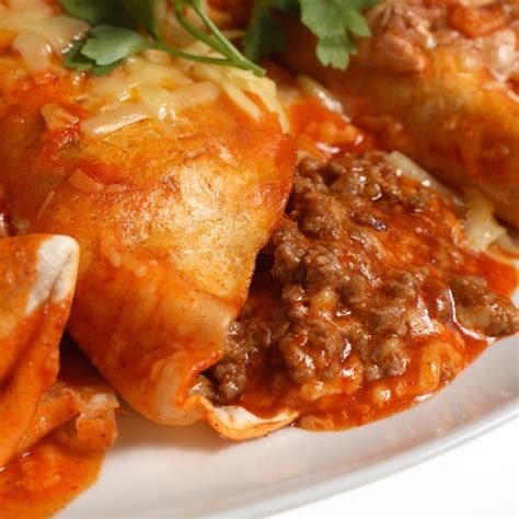 Remove the top layer of plastic wrap, invert beef mixture onto prepared baking sheet, and remove the bottom layer of plastic wrap. Cook | Recipe Finder | Spicy Ground Beef Enchiladas ...