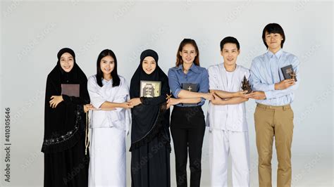 Asian Men And Women Of Different Religions Practice Buddhism Muslims