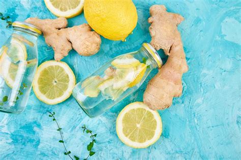 Detox Water In Bottles With Ingredients Ginger Lemon Mint Stock