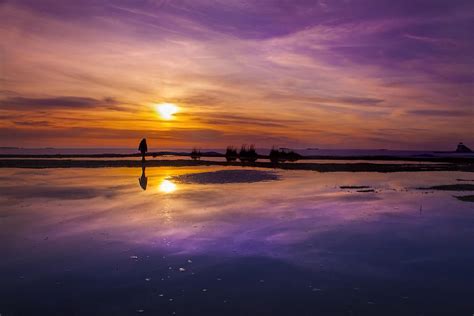 Purple And Orange Sunset With Silhouette Photograph By