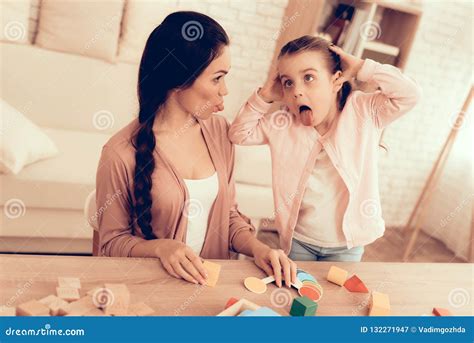 Happy Mom And Daughter Play And Make Grimaces Stock Image Image Of