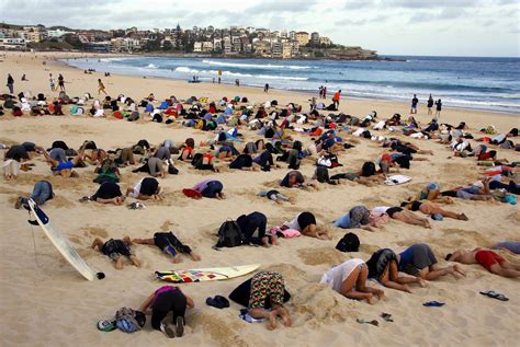 Australians Bury Heads In Sand In Climate Protest Peanut