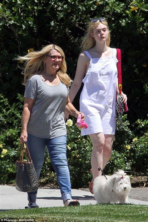 Elle Fanning Is Summer Chic On Walk With Grandma Mary And Dog Lewellen
