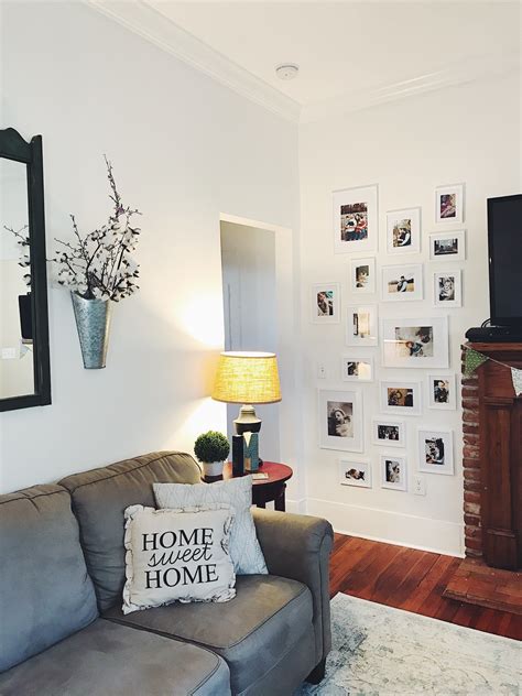 A gallery wall adds charm to any space. | Gallery wall living room ...
