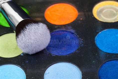 Eye Shadow Palette In Natural Colours And Makeup Brushes Stock Image