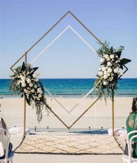 20 stunning beach wedding ceremony ideas backdrops arches and aisles