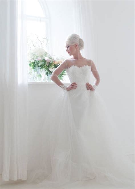 Long, sheer sleeves down to the wrist are super elegant, and work well if you're planning a traditional celebration in church or a winter still not convinced? Sophisticated straight column wedding dress with illusion ...