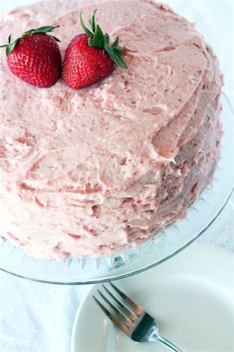 chocolate cake  fresh strawberry buttercream frosting cake  knife