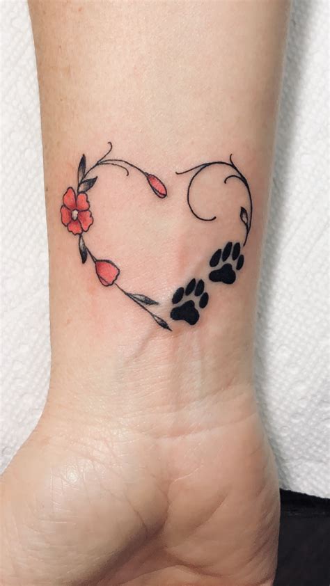 Heart With Flowers And Dog Paw Prints Tattoo Done By Inkhouse 203 In