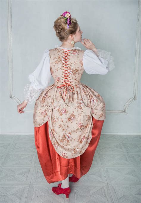 Beautiful Woman In Old Historic Medieval Dress Back Pose Stock Image