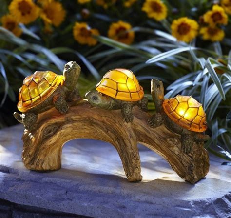 Garden statues, solar lights, and more. Turtles on a Log Solar-Powered Outdoor LED Light | Fresh Garden Decor