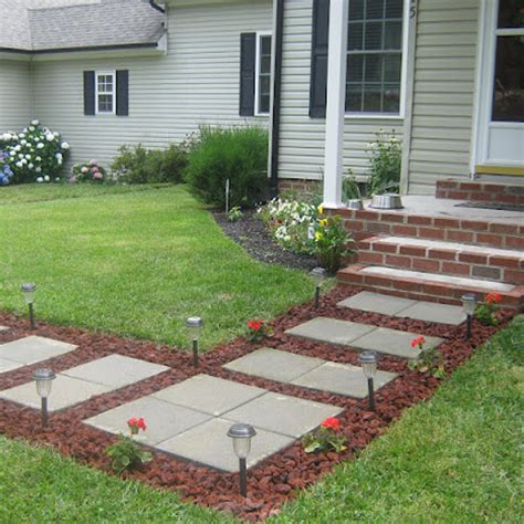 Front Walkway Built Out Of Inexpensive Cement Pavers Red Lava Rocks