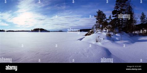 View Of Frozen Lake Saimaa Covered By Snow Puumala Finland Stock
