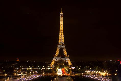 They can only be seen if you take a photo of the eiffel tower and look at it through your camera! Beautiful Eiffel Tower at Night Wallpaper | HD Wallpapers