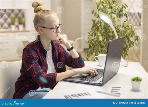 Blonde Girl With Glasses Work On A Laptop And Rest At Home Home School
