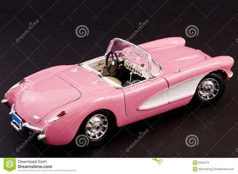 This car deserves better treatment. Pink Stylish Classic Sports Car Stock Image - Image: 6040473