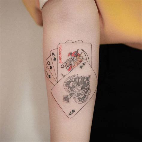 Playing Cards Tattoo On The Inner Forearm