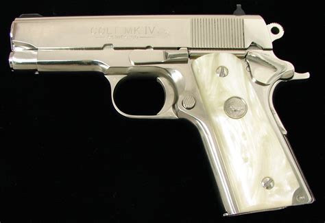 Colt Officers Model 45 Acp Caliber Pistol Bright Stainless Model With