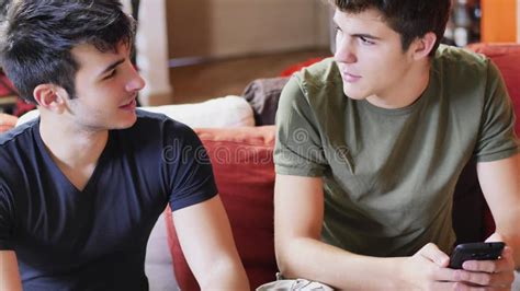 Two Young Men Talking And Chatting Stock Image Image Of Conversation