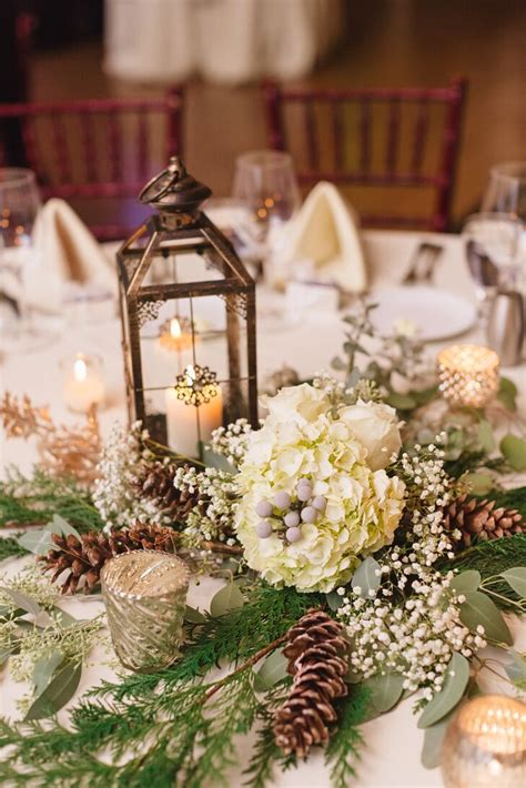 Holiday centerpiece arrangement christmas centerpiece. Centerpiece with Lantern, Pinecones, and Hydrangeas